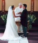 bride & groom at altar